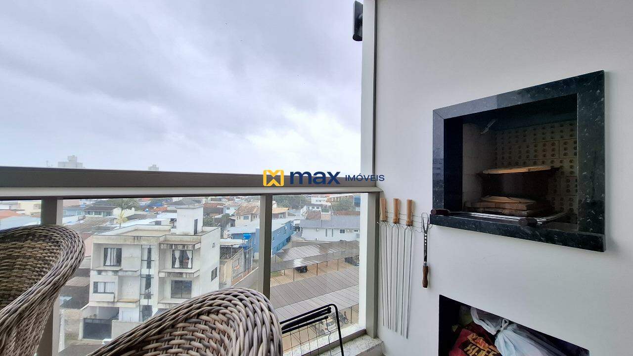 Apartamento à venda no São Vicente: Sacada com churrasqueira