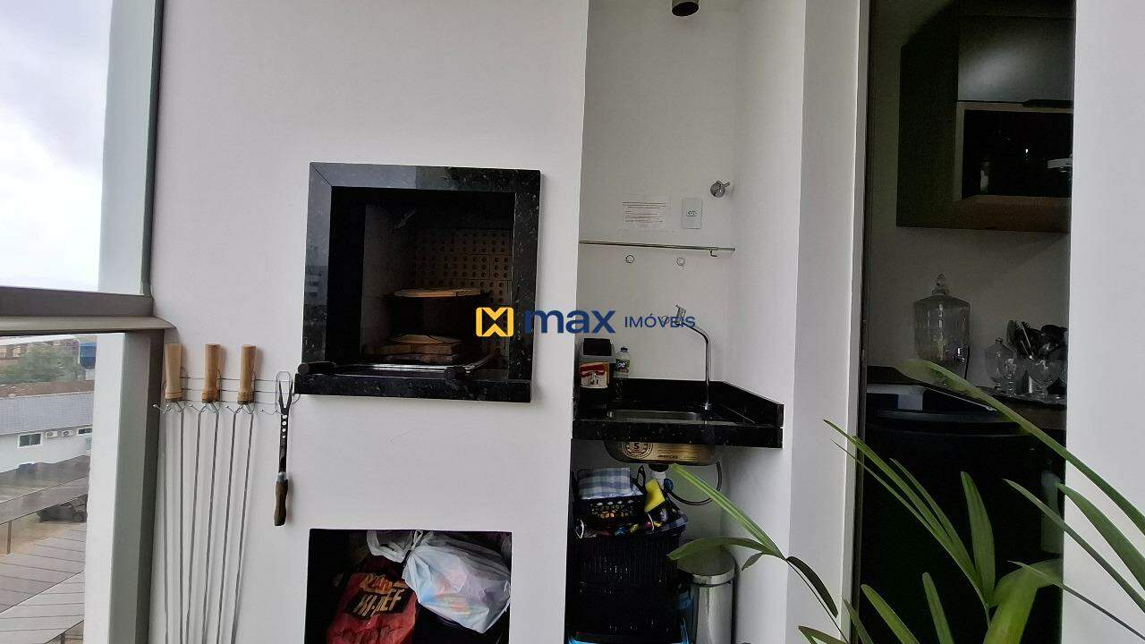 Apartamento à venda no São Vicente: Sacada com churrasqueira