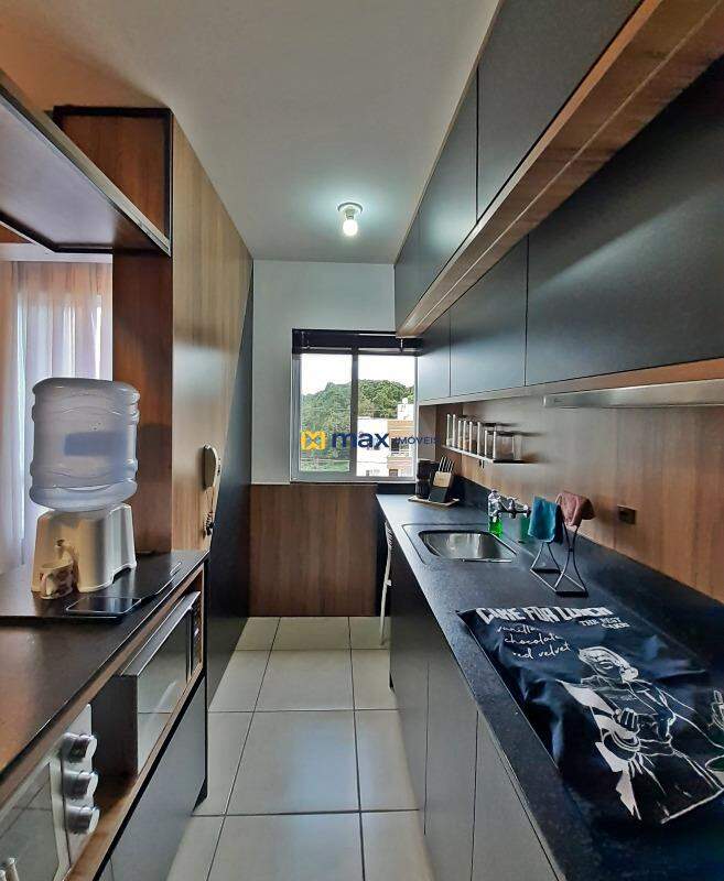 Apartamento à venda no Meia Praia: Cozinha e Lavanderia