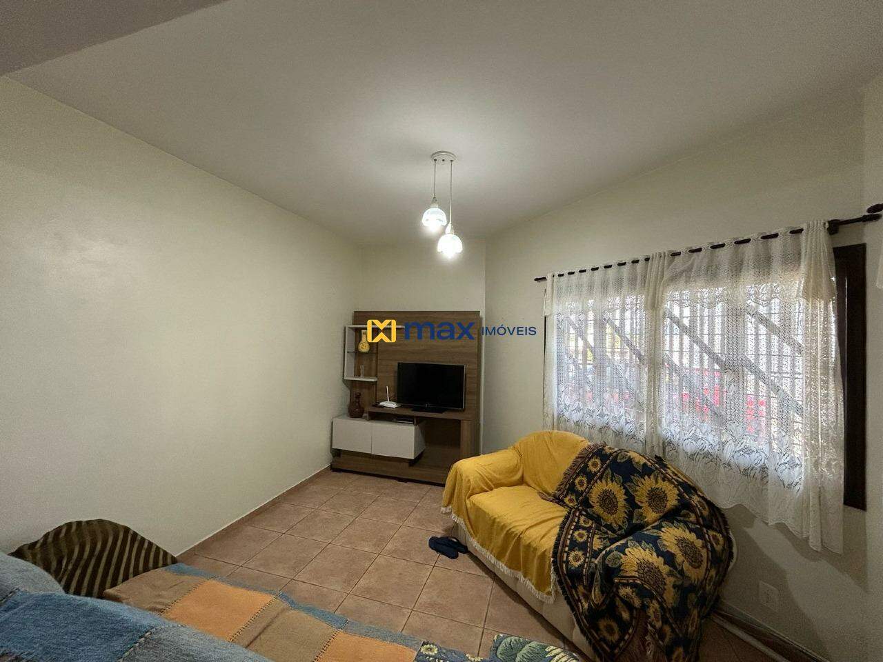 Casa à venda no Armação de Itapocoroy: Sala de estar e TV (Térreo)