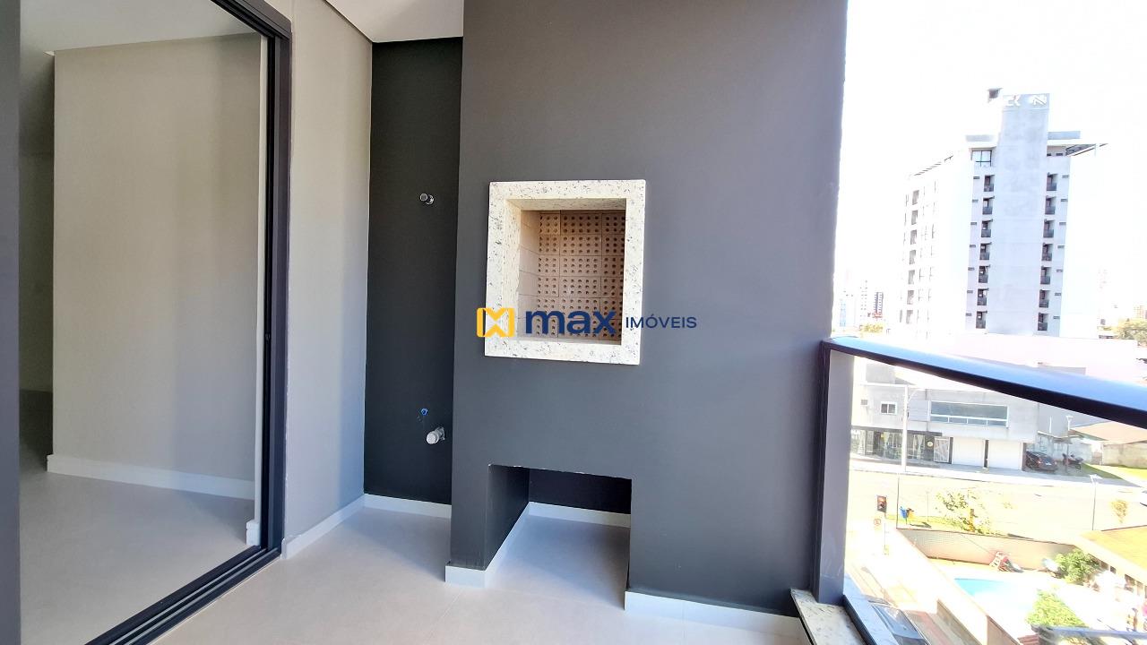 Apartamento à venda no Centro: Sacada com churrasqueira