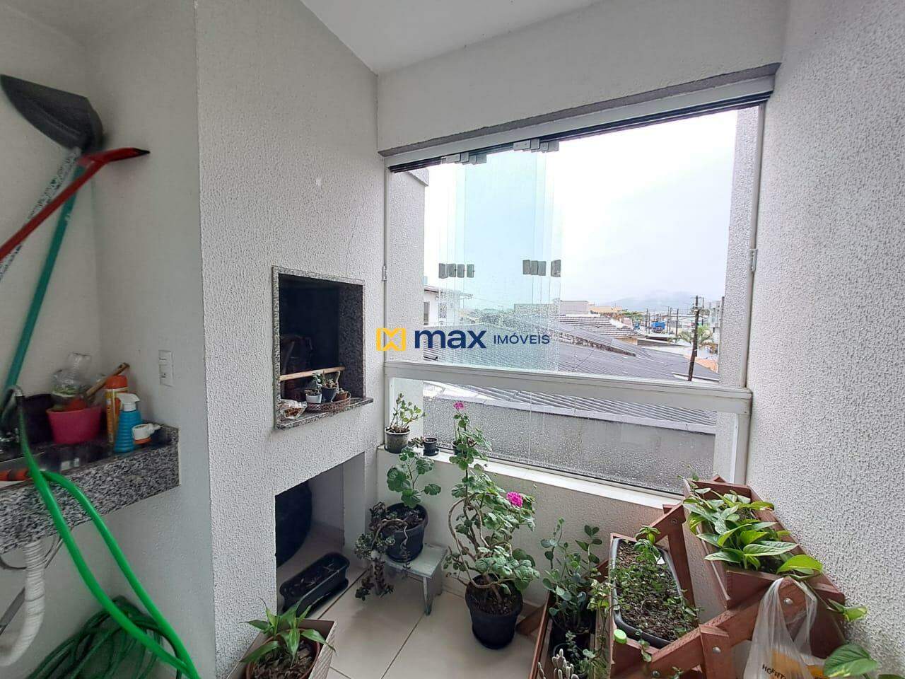 Apartamento à venda no São Vicente: Sacada com churrasqueira