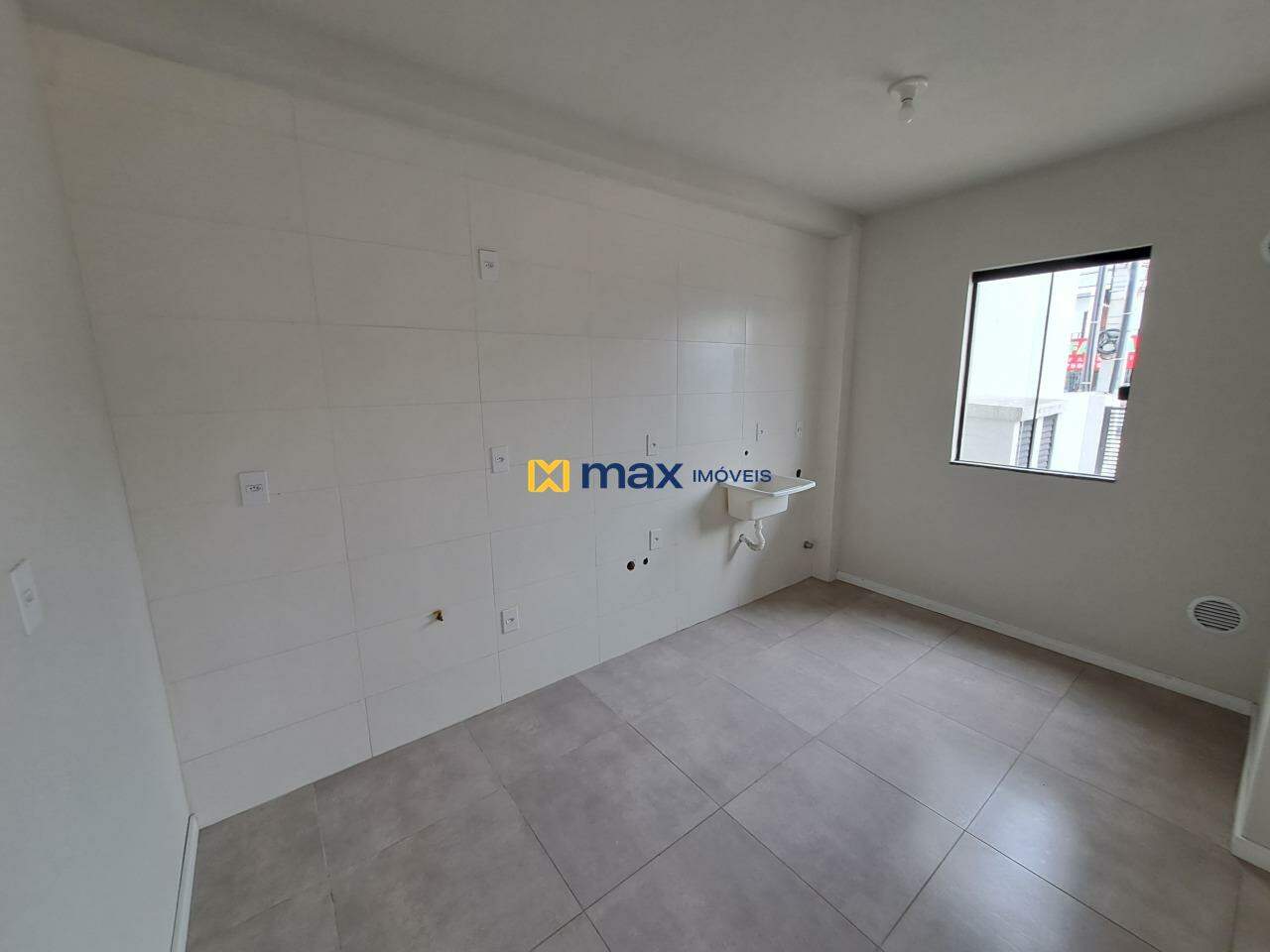 Apartamento à venda no Espinheiros: Cozinha/ Lavanderia