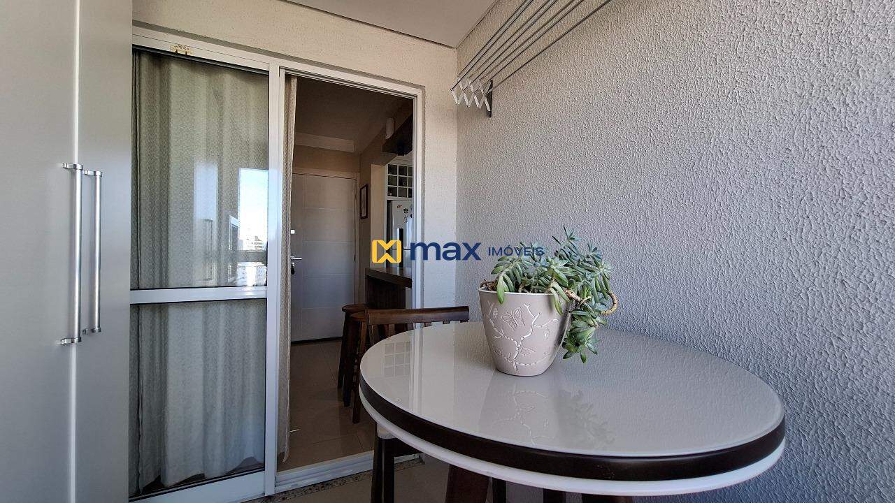 Apartamento à venda no Centro: Sacada com churrasqueira