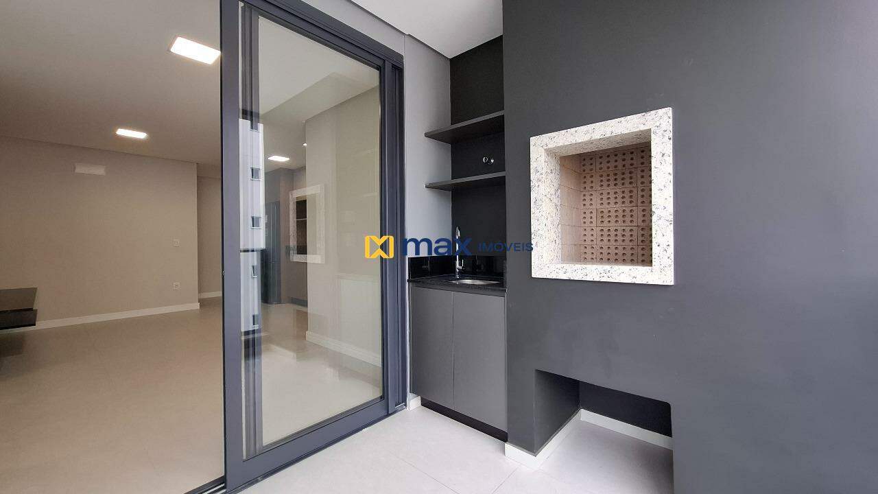 Apartamento à venda no Centro: Sacada com churrasqueira