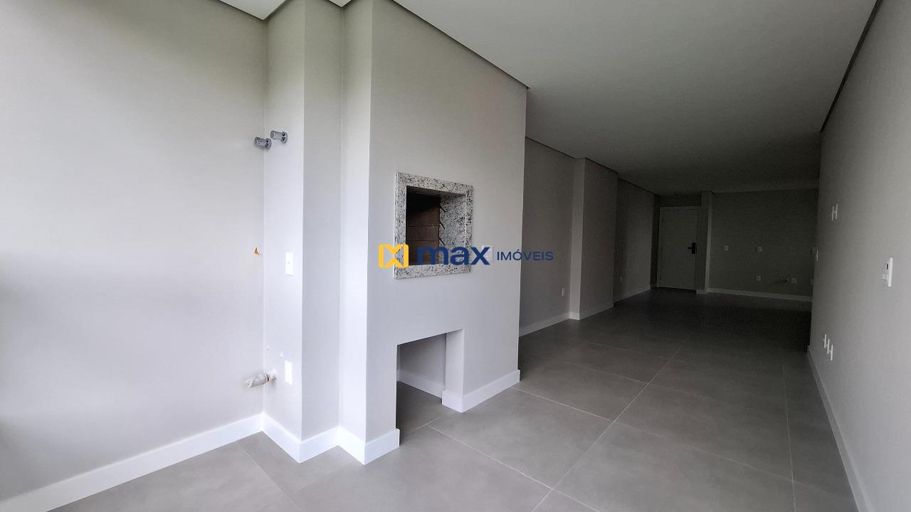 Apartamento à venda no Centro: Sacada com churrasqueira