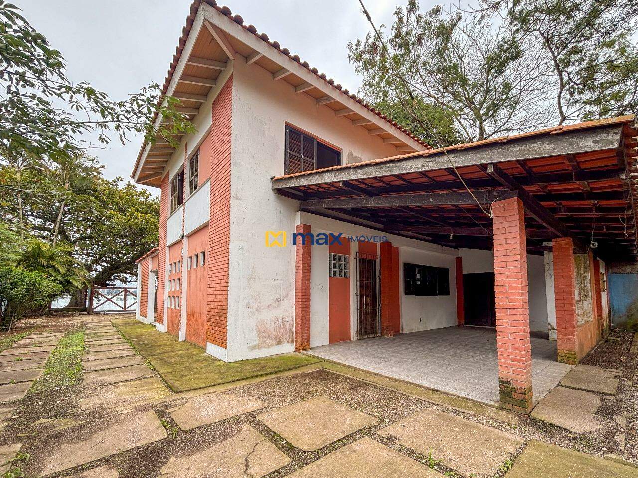 Casa à venda no Praia De Armação: Fundos