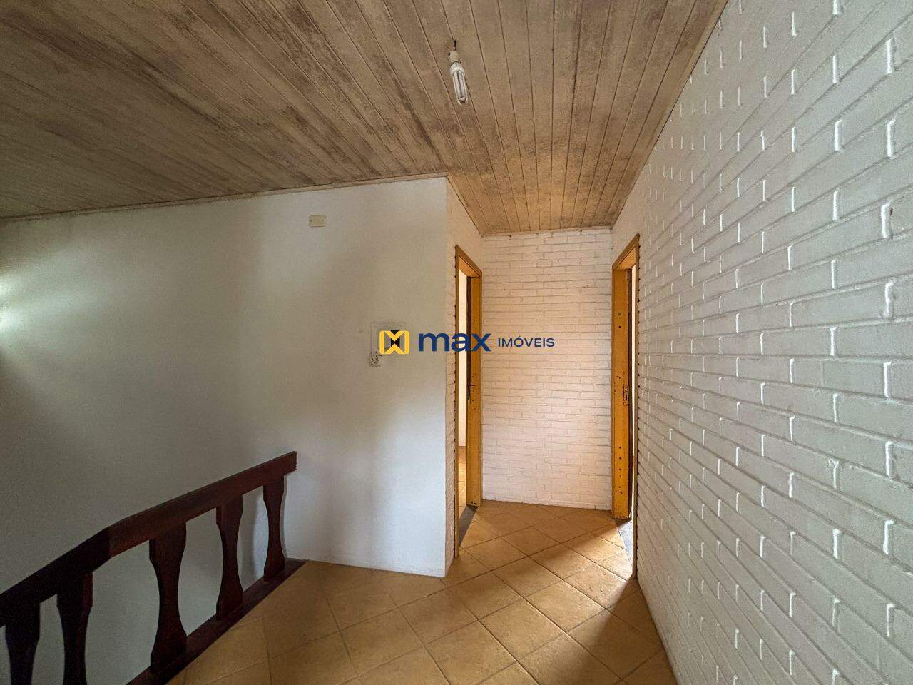 Casa à venda no Praia De Armação: Corredor dormitórios