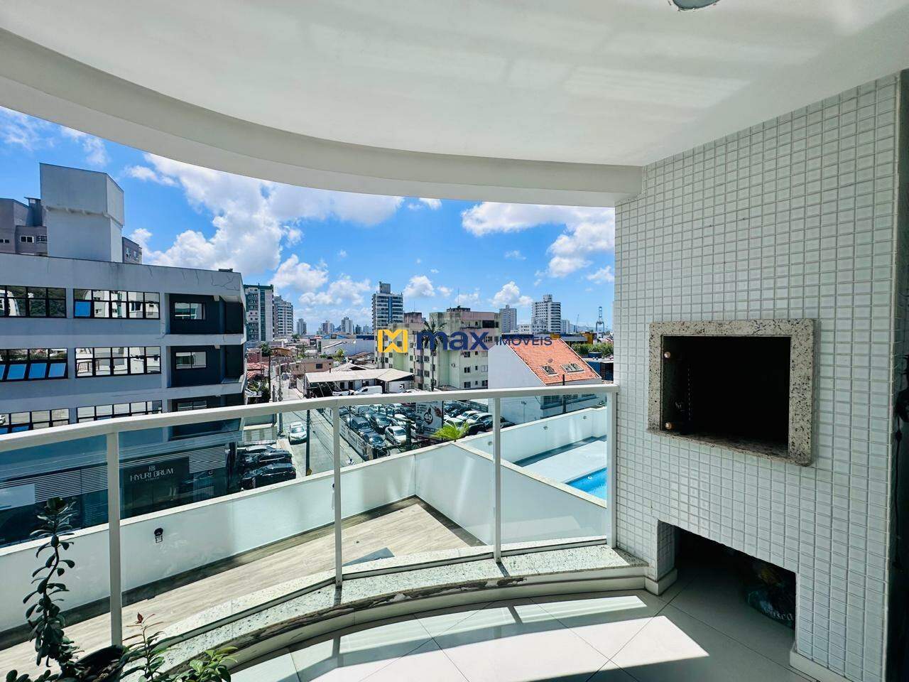 Apartamento à venda no Centro: Sacada com churrasqueira