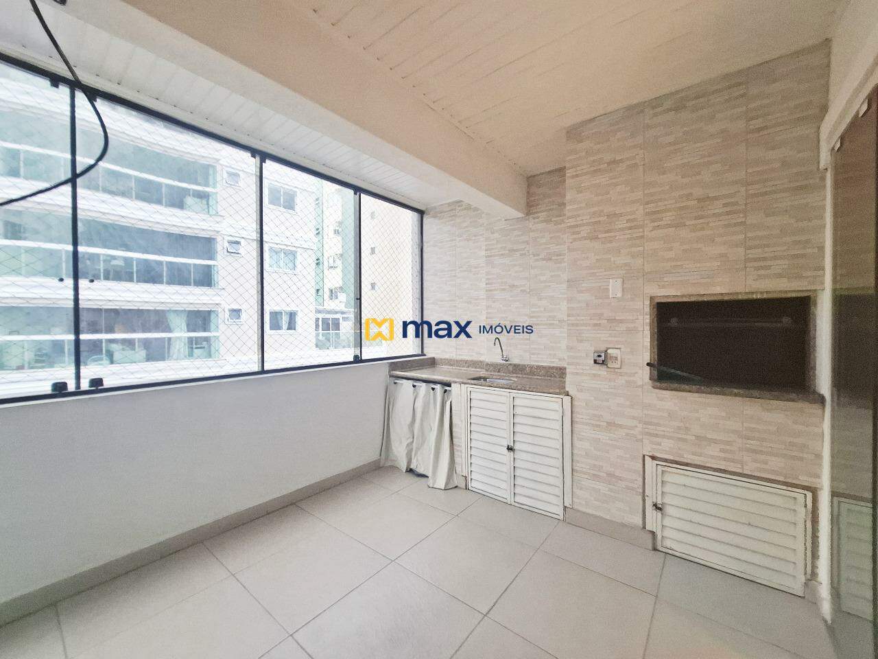 Apartamento à venda no Centro: Sacada com Churrasqueira