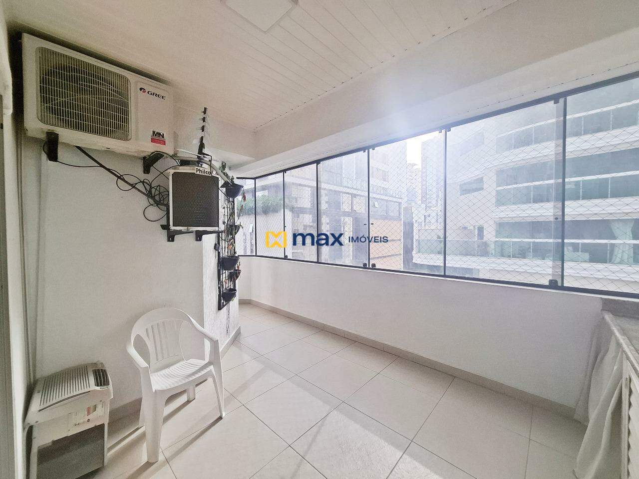 Apartamento à venda no Centro: Sacada com Churrasqueira