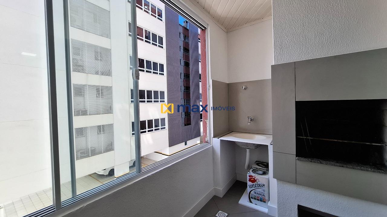 Apartamento à venda no Centro: Sacada com churrasqueira