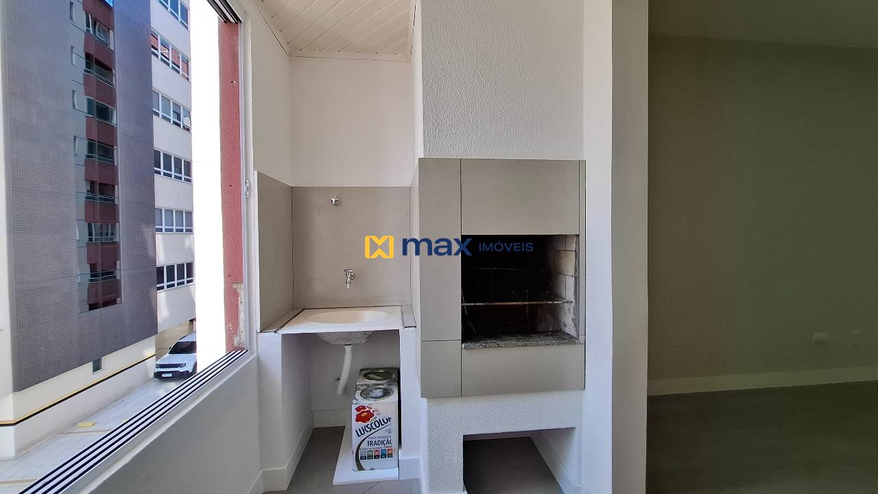 Apartamento à venda no Centro: Sacada com churrasqueira