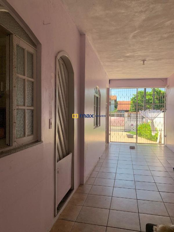 Casa à venda no Meia Praia: Garagem coberta