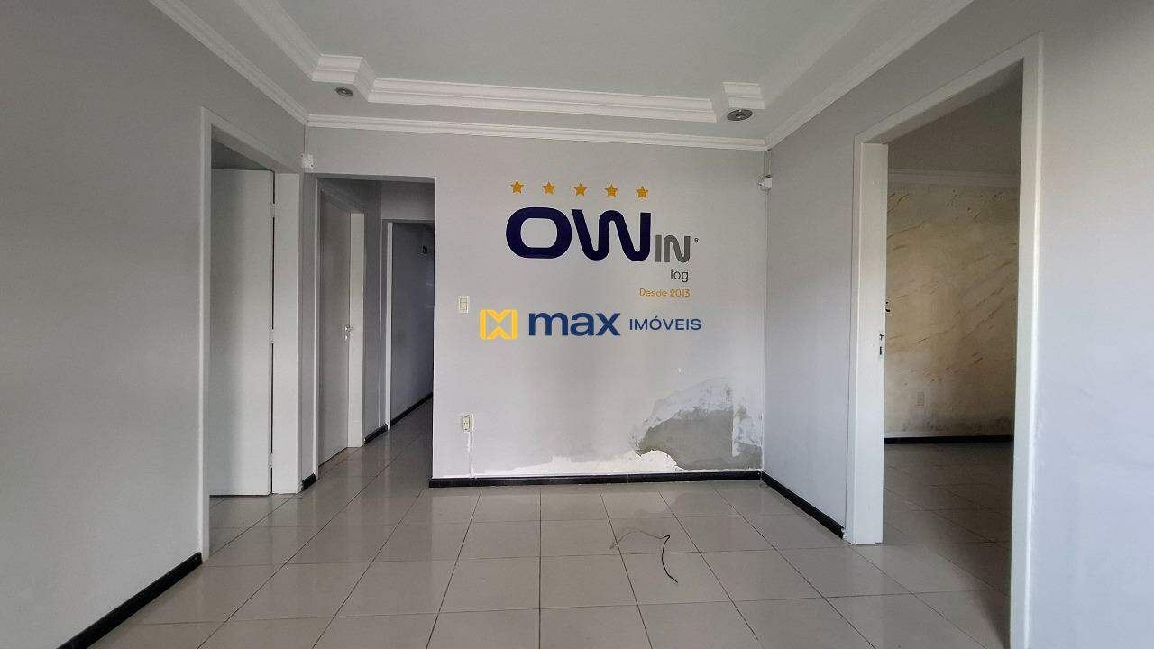 Casa Comercial à venda no São Vicente: Sala de estar