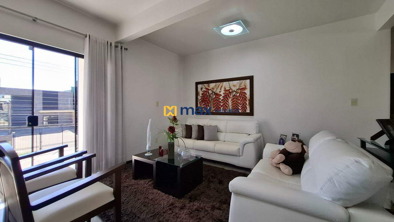 Casa Comercial à venda no São Vicente: Living integrado