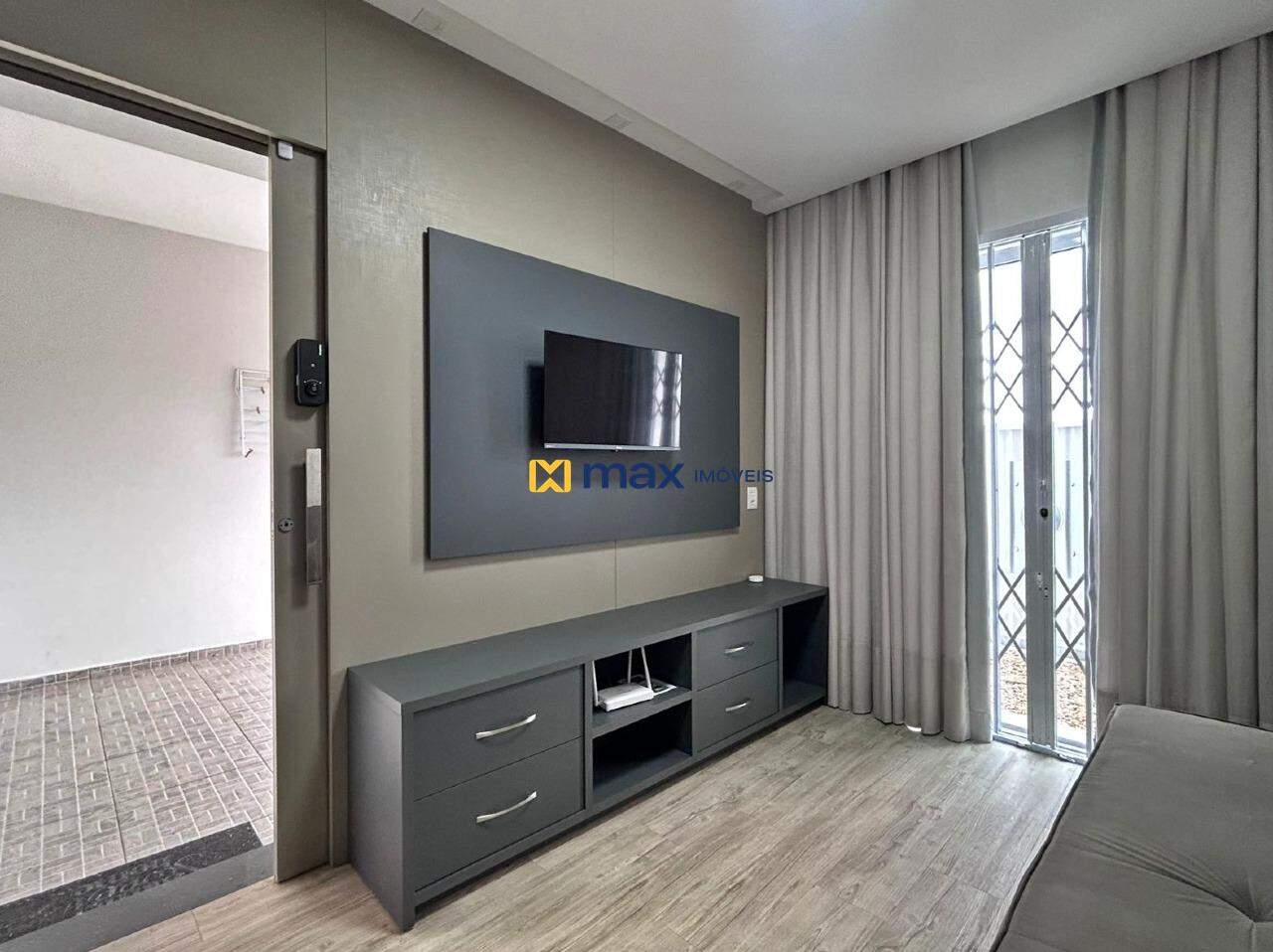 Casa à venda no Centro: Sala de estar e TV