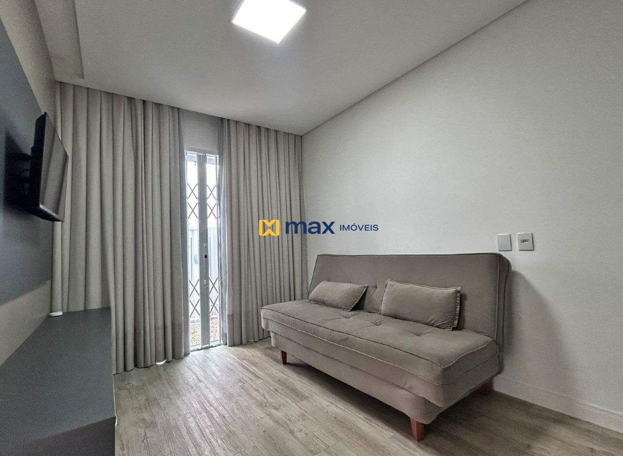 Casa à venda no Centro: Sala de estar e TV