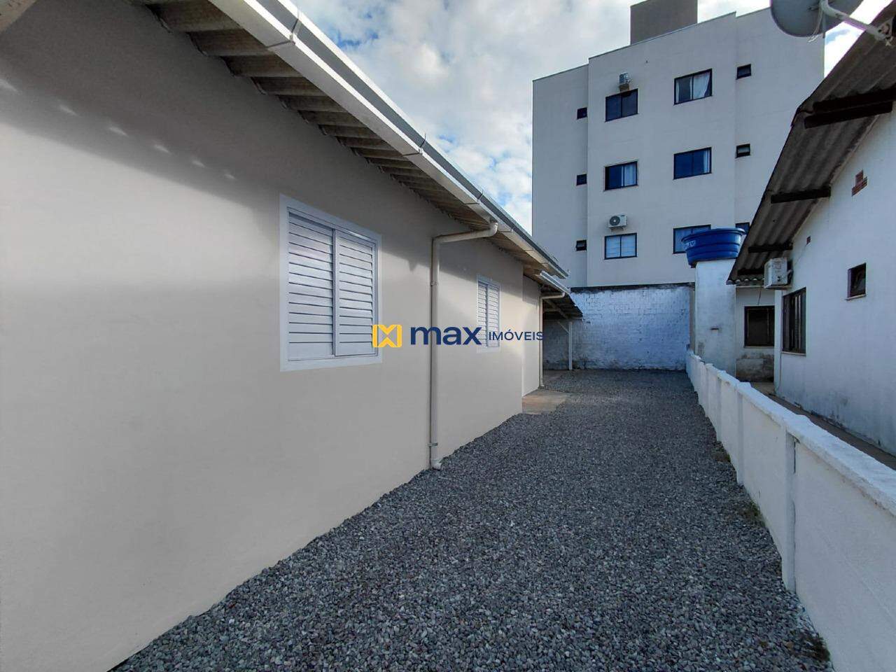 Casa para aluguel no Centro: Lateral