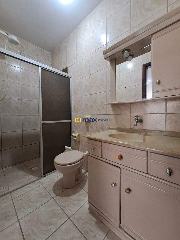 Casa para aluguel no Centro: Banheiro garagem