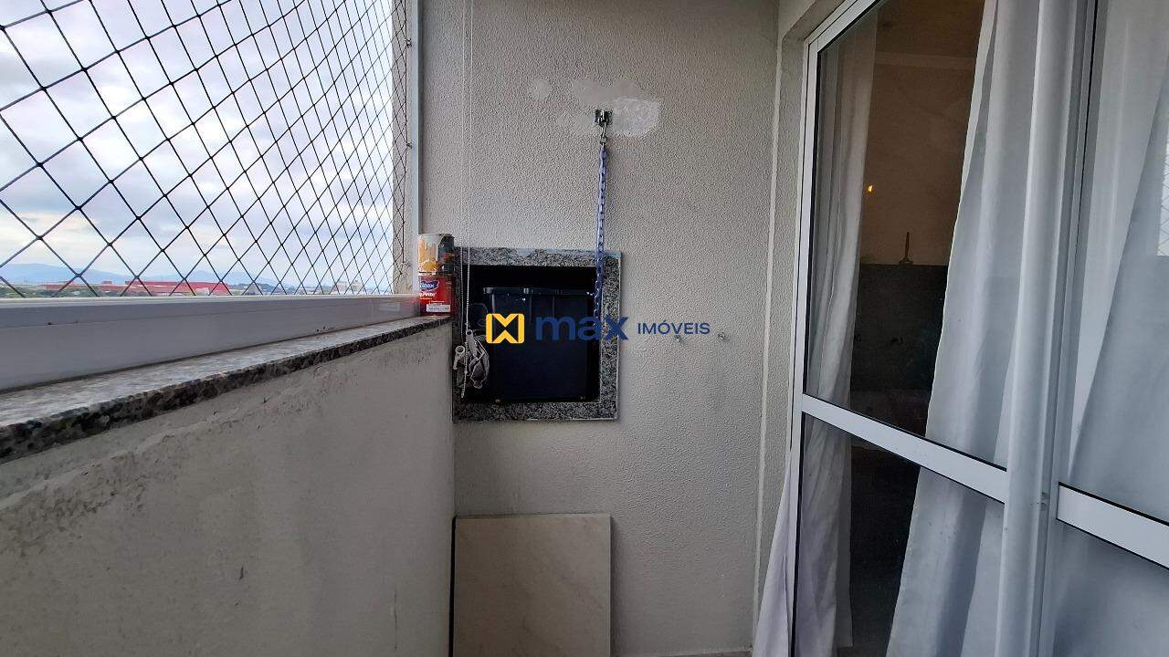 Apartamento à venda no São Vicente: Sacada com churrasqueira