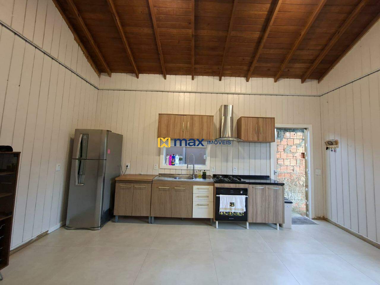 Casa para aluguel no São Vicente: Sala de estar/jantar e cozinha