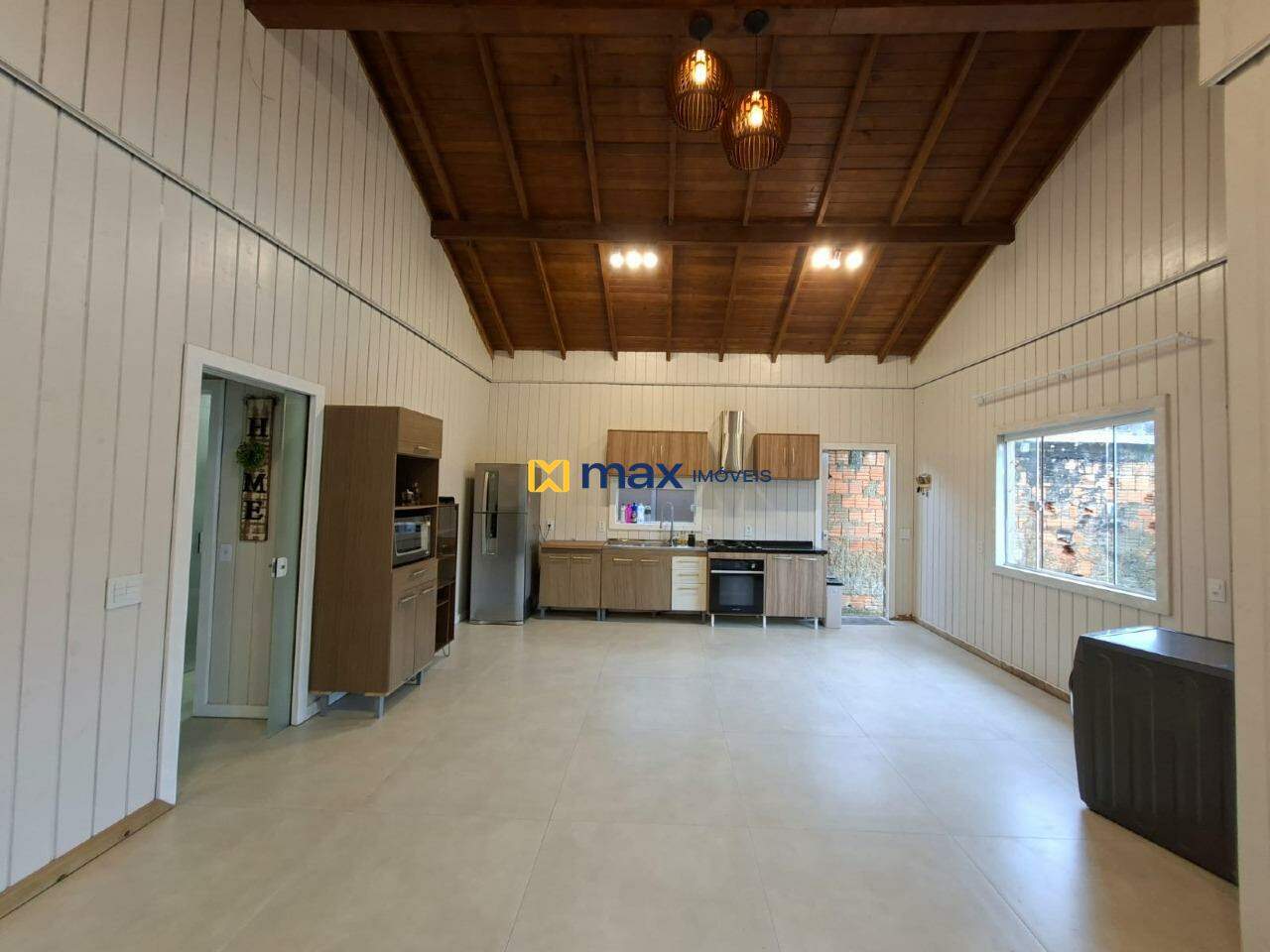 Casa para aluguel no São Vicente: Sala de estar/jantar e cozinha