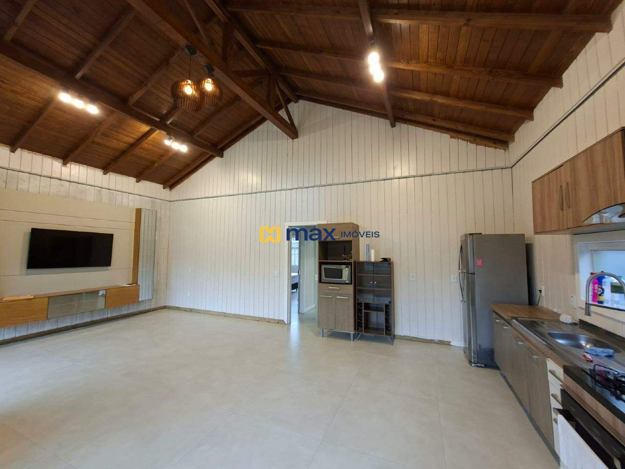 Casa para aluguel no São Vicente: Sala de estar/jantar e cozinha