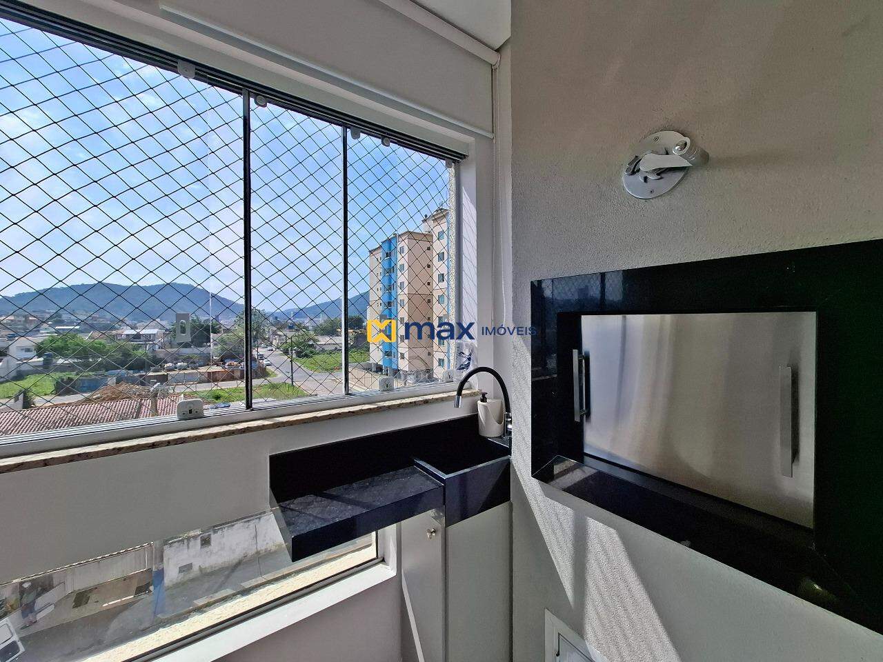 Apartamento à venda no Tabuleiro: sacada com churrasqueira