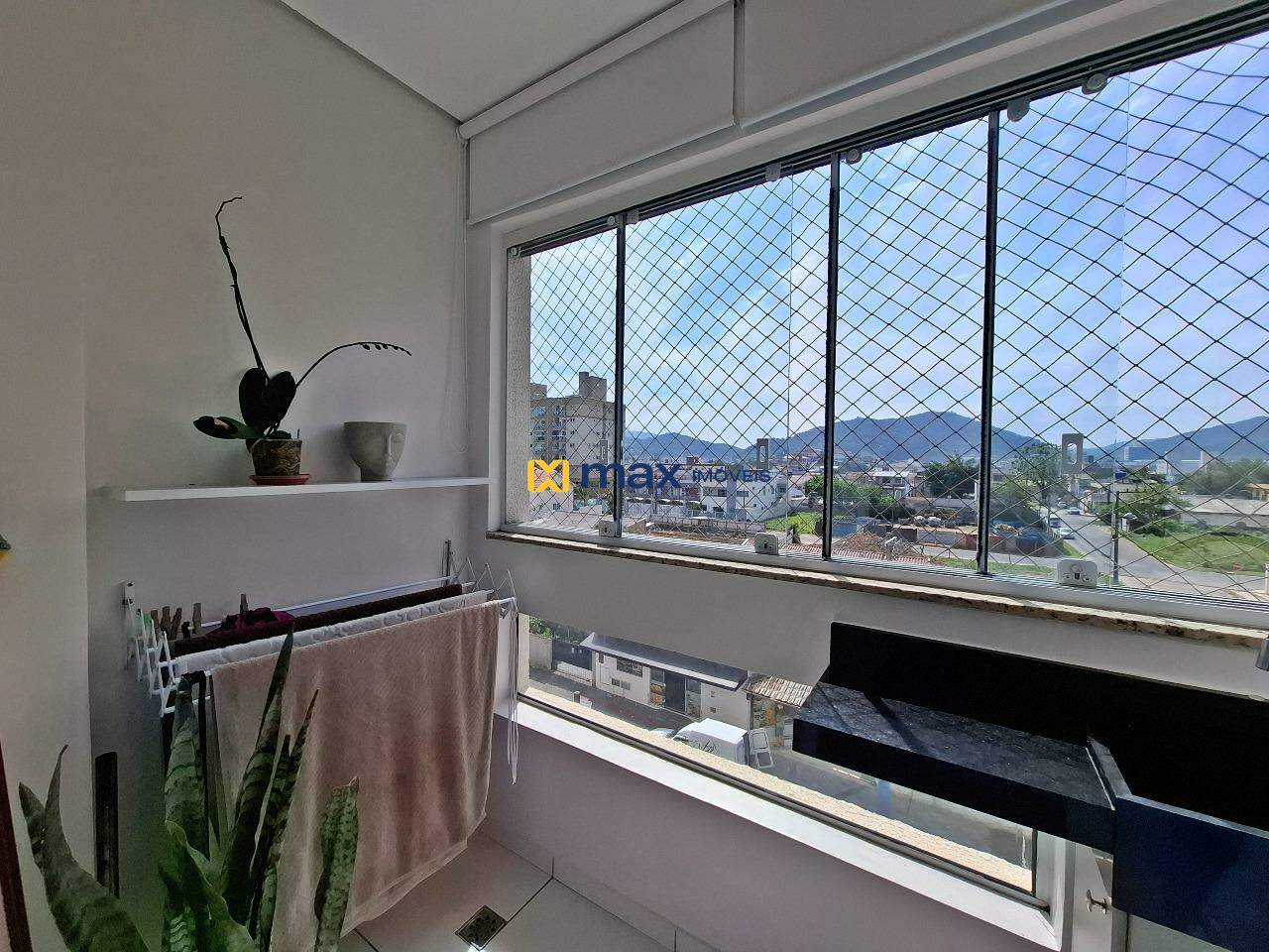 Apartamento à venda no Tabuleiro: sacada com churrasqueira