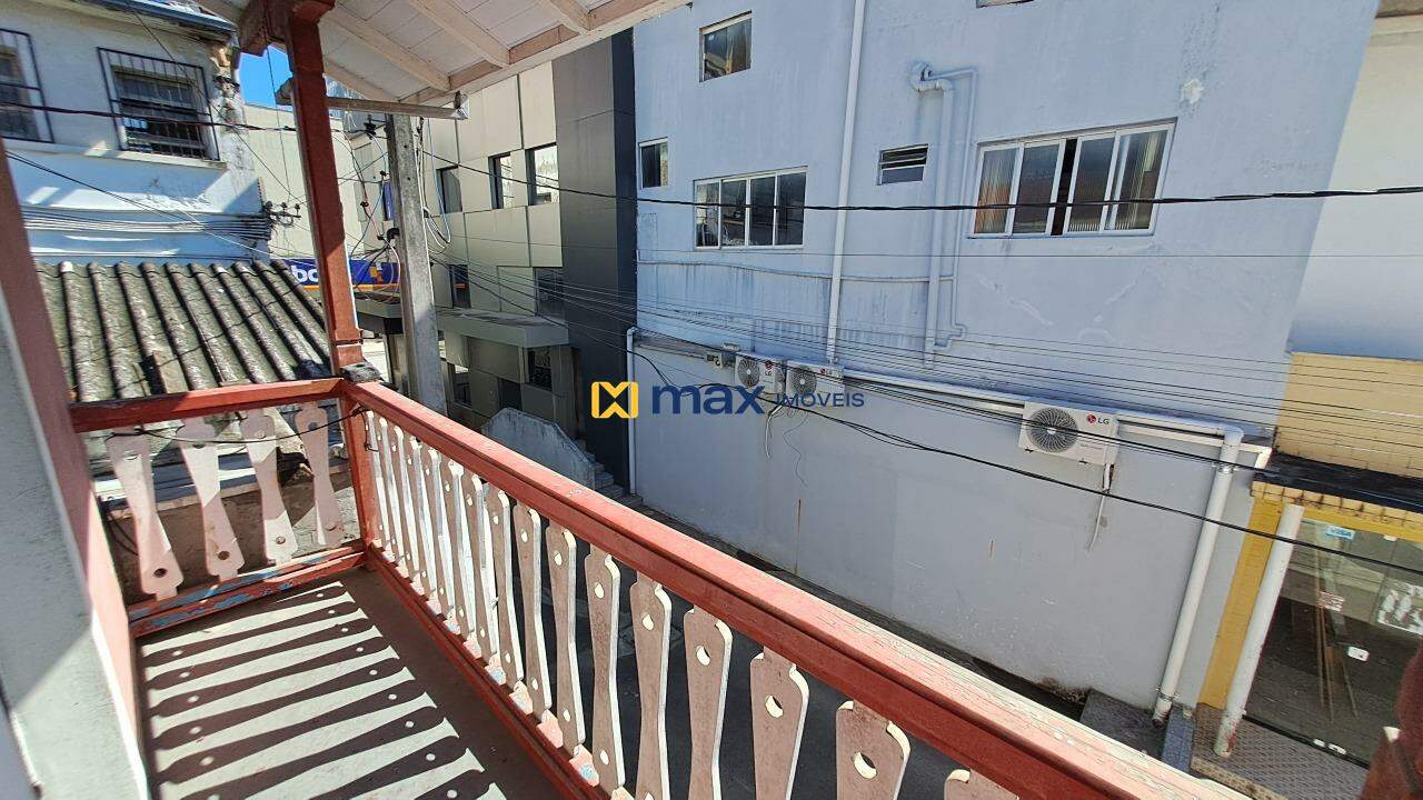 Casa Comercial para aluguel no Centro: Sacada