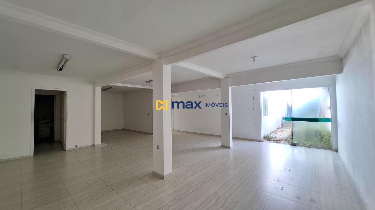 Casa à venda no Centro: Sala fundos 