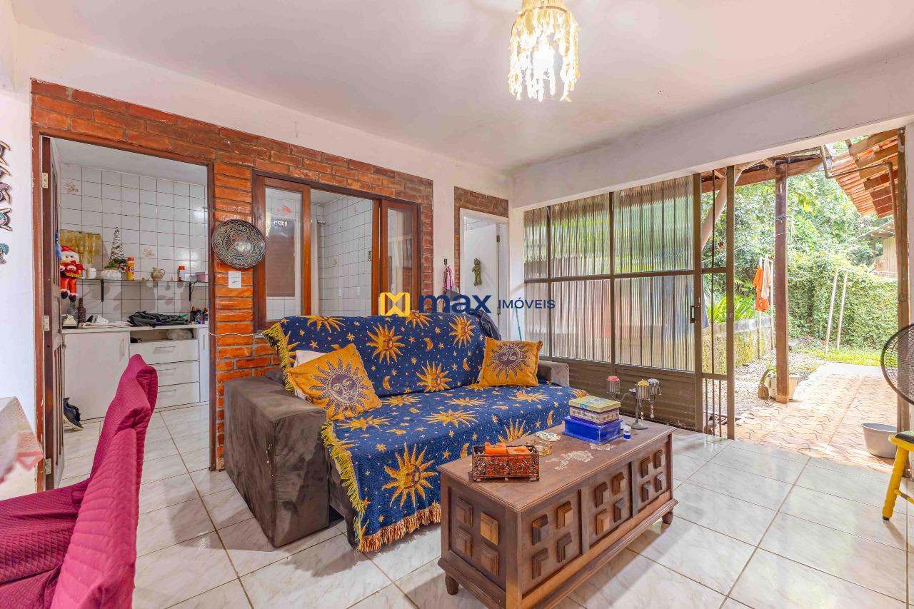 Casa à venda no Fazenda: Living integrado - Apartamento fundos