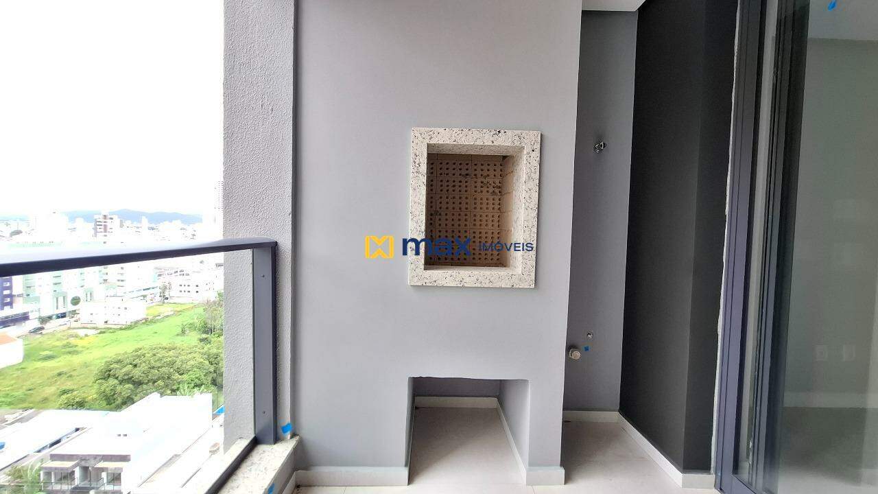 Apartamento à venda no Centro: Sacada com churrasqueira