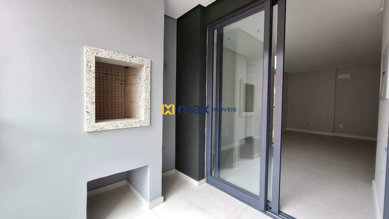 Apartamento à venda no Centro: Sacada com churrasqueira