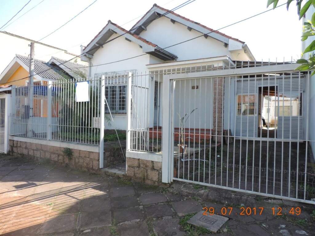 Casa com 255m², 4 dormitórios, 3 vagas no bairro Nossa Senhora das Graças em Canoas para Comprar