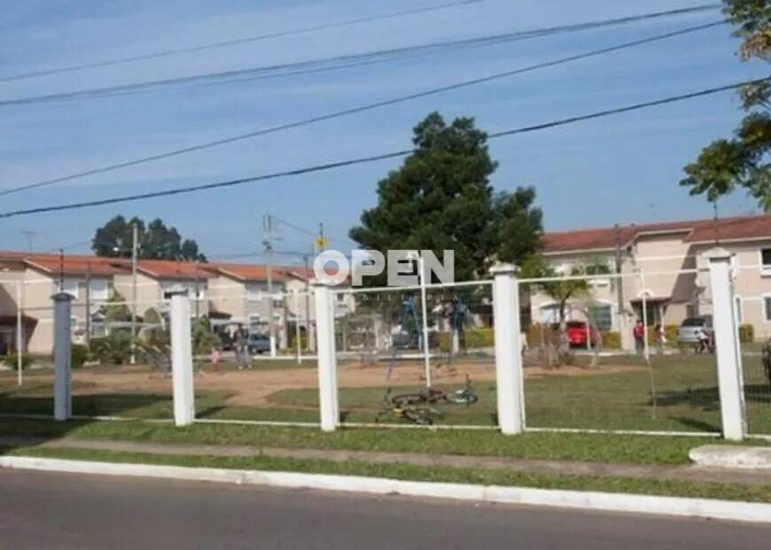 Casa em Condomínio  com 130m², 2 dormitórios, 1 suíte, 1 vaga no bairro Igara em Canoas para Comprar