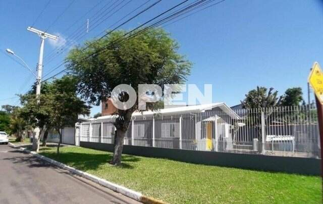 Casa com 220m², 3 dormitórios, 3 vagas no bairro Rio Branco em Canoas para Comprar