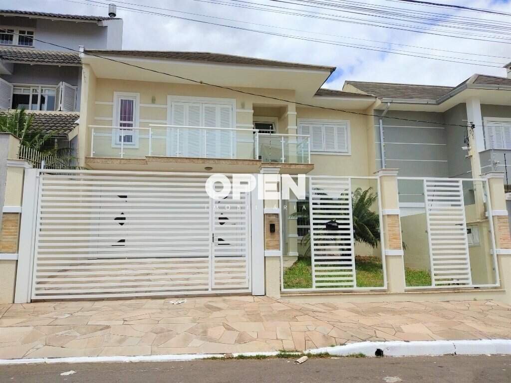 Sobrado com 206m², 4 dormitórios, 1 suíte, 2 vagas no bairro Moinhos de Vento em Canoas para Comprar