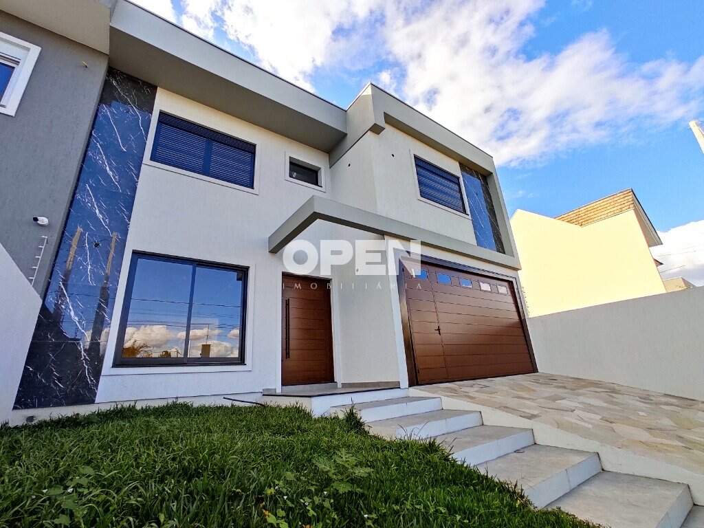 Sobrado com 251m², 3 dormitórios, 3 suítes, 2 vagas no bairro Mont Serrat em Canoas para Comprar