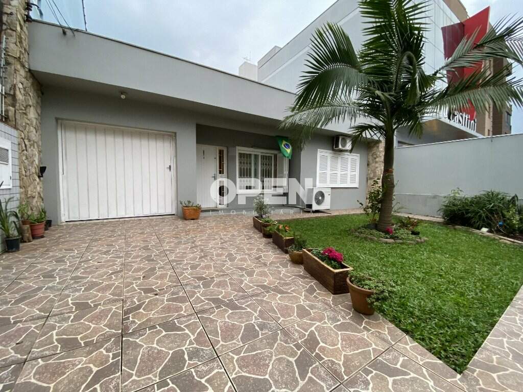 Casa com 300m², 3 dormitórios, 1 suíte, 2 vagas no bairro Marechal Rondon em Canoas para Comprar