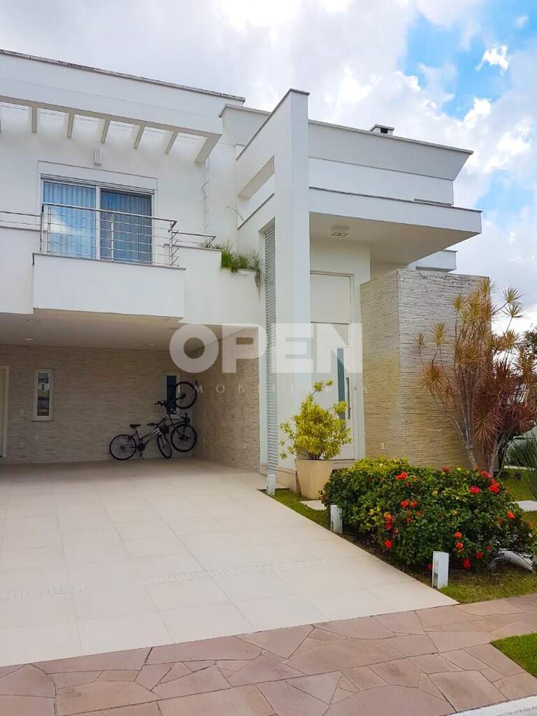 Casa em Condomínio  com 305m², 3 dormitórios, 3 suítes, 4 vagas no bairro Marechal Rondon em Canoas para Comprar