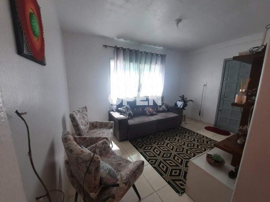 Casa com 100m², 3 dormitórios, 2 vagas no bairro Fátima em Canoas para Comprar