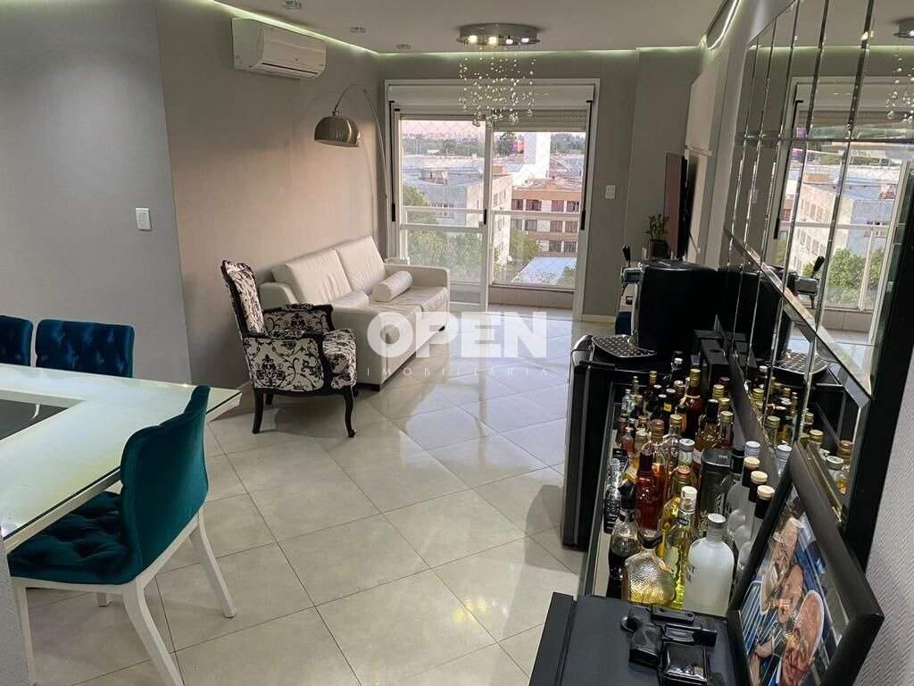 Apartamento com 70m², 2 dormitórios, 1 suíte, 2 vagas no bairro Nossa Senhora das Graças em Canoas para Comprar