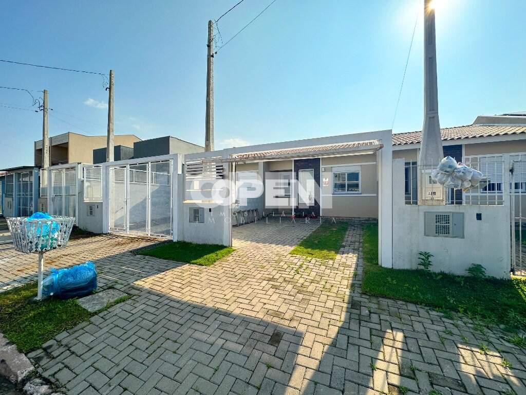 Casa com 54m², 2 dormitórios, 1 vaga no bairro Olaria em Canoas para Comprar