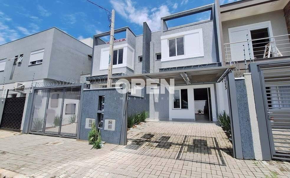 Sobrado com 125m², 3 dormitórios, 1 suíte, 2 vagas no bairro Quintas do Palermo em Canoas para Comprar