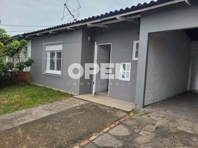 Casa com 154m², 3 dormitórios, 2 vagas no bairro Harmonia em Canoas para Comprar