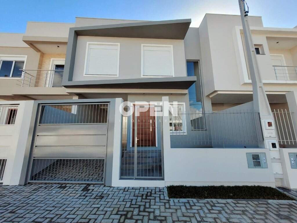 Sobrado com 154m², 3 dormitórios, 2 suítes, 2 vagas no bairro Nossa Senhora das Graças em Canoas para Comprar