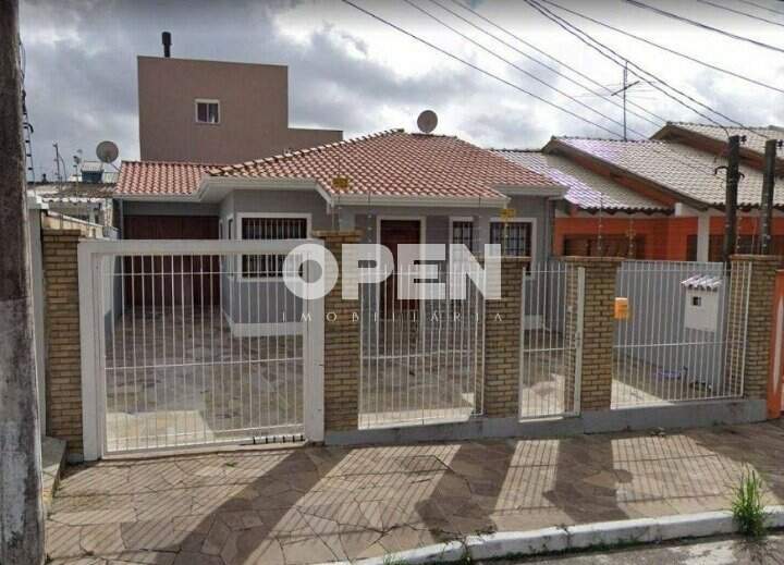 Casa com 200m², 2 dormitórios, 1 suíte, 2 vagas no bairro Estância Velha em Canoas para Comprar