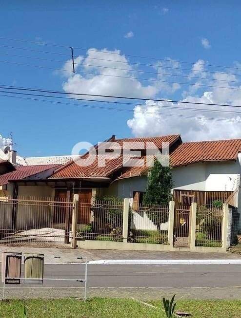 Casa com 200m², 3 dormitórios, 2 vagas no bairro Estância Velha em Canoas para Comprar